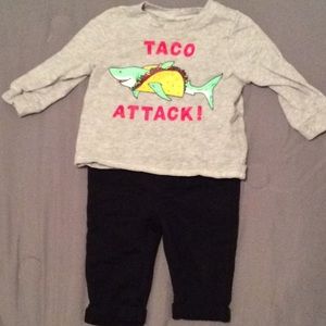 a taco attack shirt with black pants